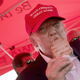 Donald Trump eats a pork chop on a stick and gives a thumbs up sign to fairgoers at the Iowa State Fair on August 15, 2015 in Des Moines, Iowa.